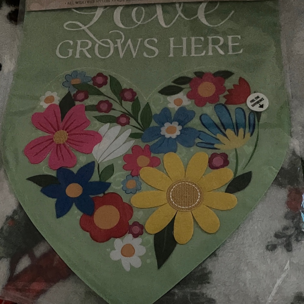 Love Grows Here Garden Flag